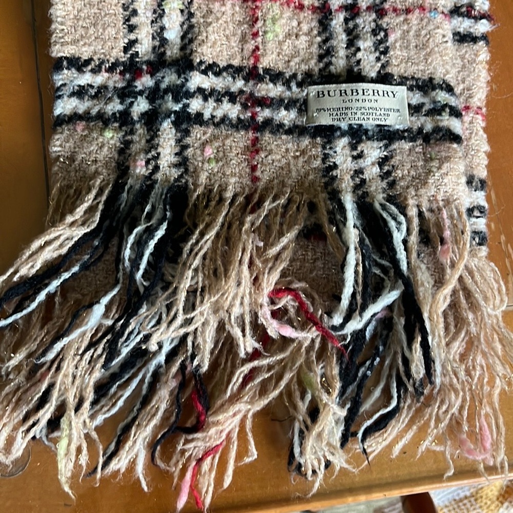 Burberry merino wool plaid scarf. Pre-owned but purchased in NYC in 2009.